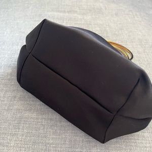 The Row barely used night time bag. Silk material. Fits an I phone 13.